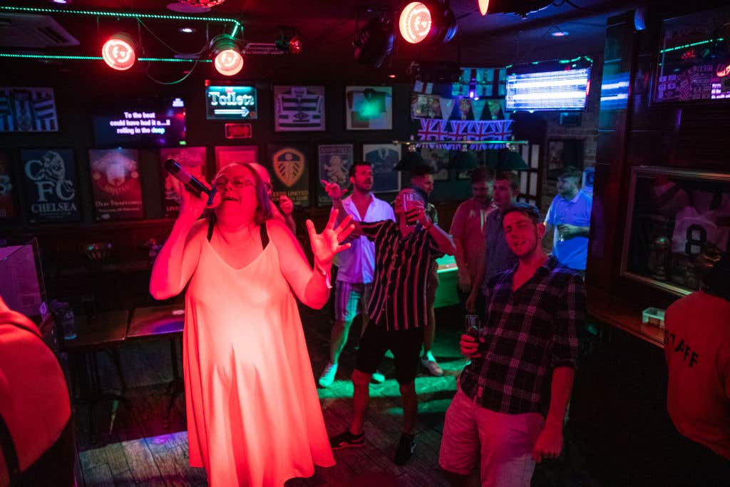 British Tourists In Benidorm Pay Tribute To Queen Elizabeth II