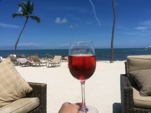 Glass of wine on the beach