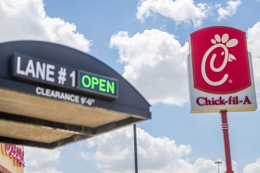 Chick-fil-A restaurant sign is seen from a drive-thru