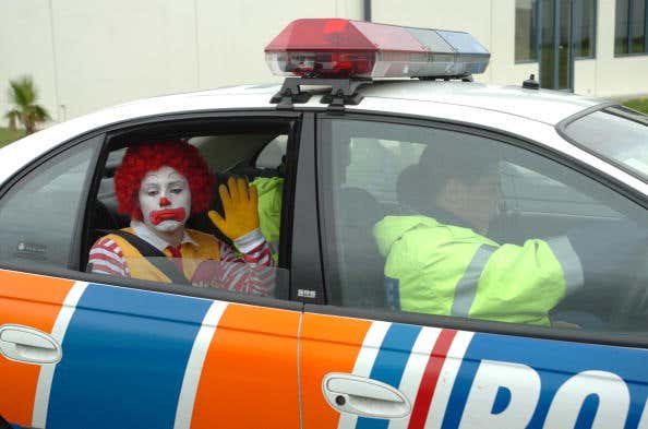 A Greenpeace protestor dressed like Ronald... Reminds me of Florida Food Felon Clown.