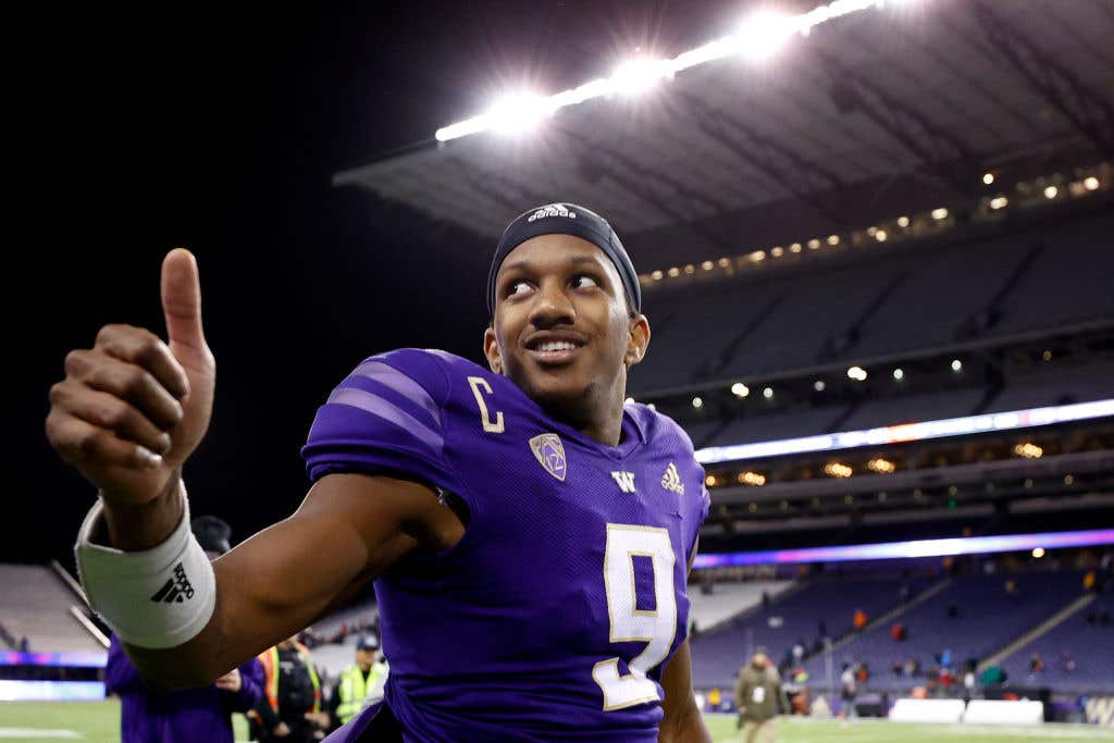 Michael Penix Jr. #9 of the Washington Huskies celebrates after beating Oregon State Beavers 24-21 at Husky Stadium on November 04, 2022 in Seattle, Washington. A look at 2023 Heisman Trophy candidates so far.