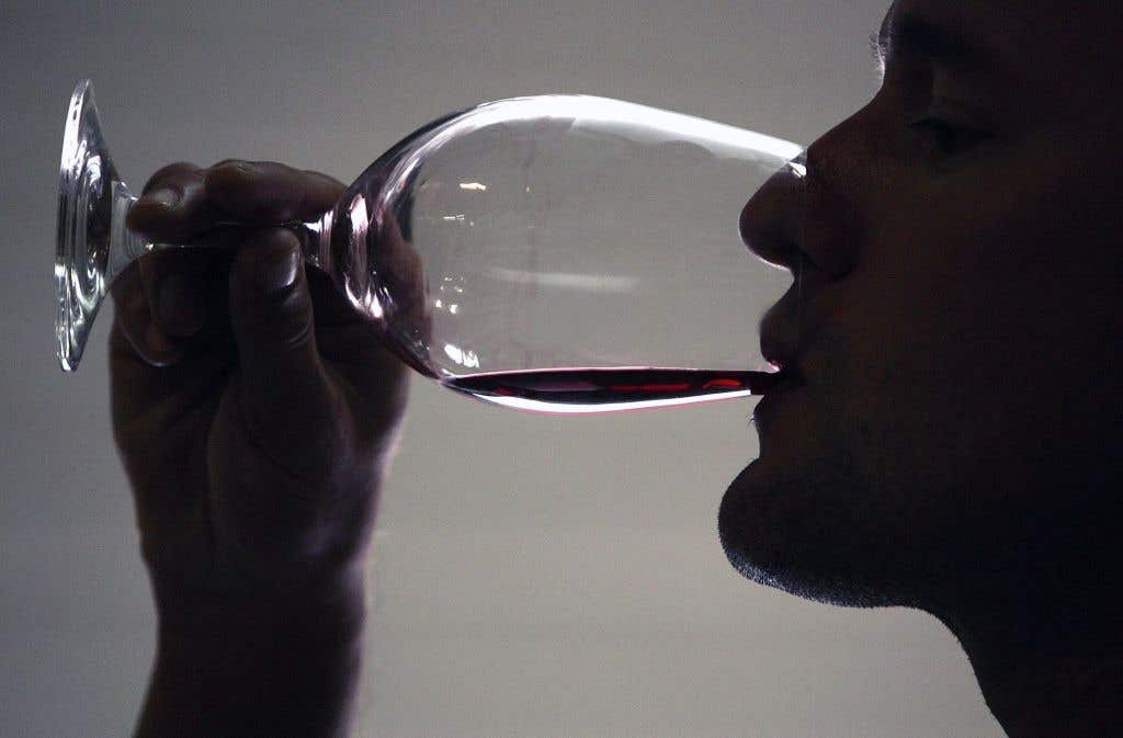 silhouette of a man drinking wine. Wines for Fall in Florida