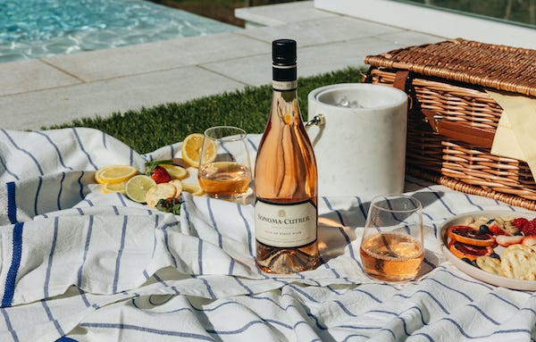 Bottle of Sonoma Cutrer Rose by a pool