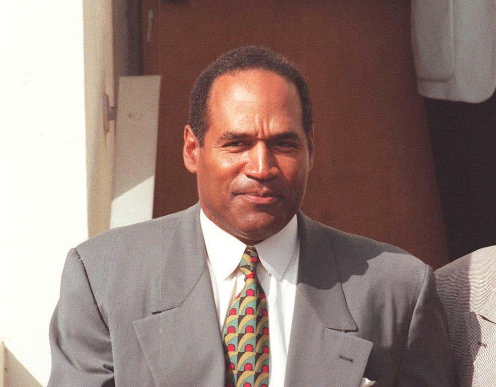 O.J. Simpson leaving court in Santa Monica where a verdict is expected this week in his civil trial. (01-27-97 Los Angeles, Ca.)