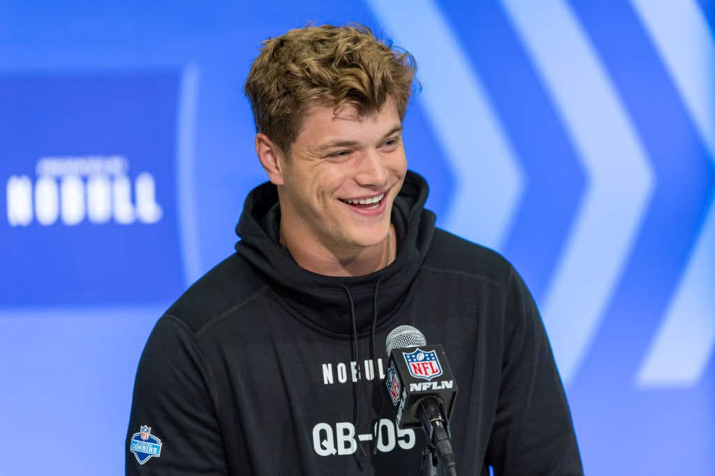 JJ McCarthy #QB05 of the Michigan Wolverines speaks to the media during the 2024 NFL Draft Combine at Lucas Oil Stadium. Let's get into the top five quarterbacks in the NFL Draft