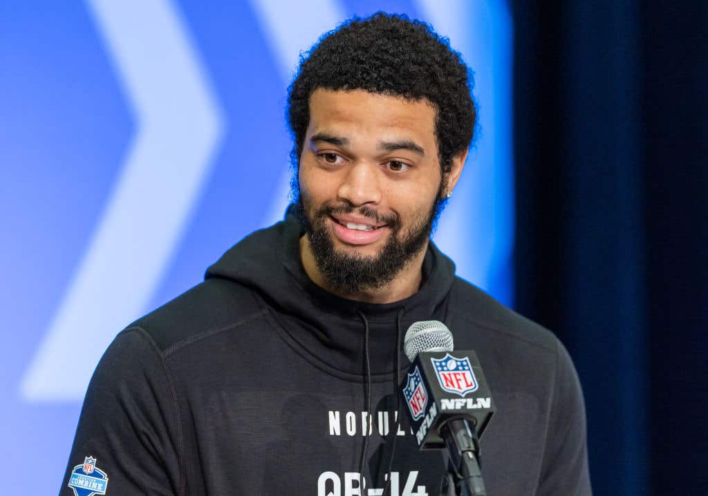 Caleb Williams #QB14 of the Southern California Trojans speaks to the media during the 2024 NFL Draft Combine at Lucas Oil Stadium. It's historic just how much buzz quarterbacks are getting in the 2024 NFL Mock Draft predictions.