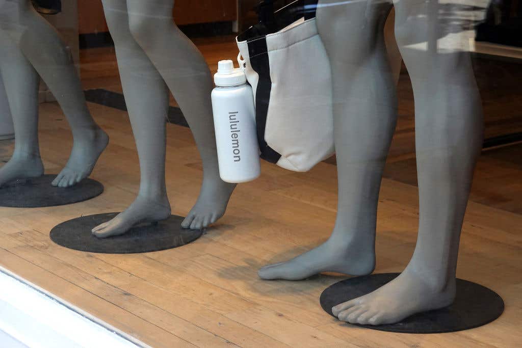 The Lululemon logo is seen on a water bottle in window display at a Lululemon store. New stores at coconut point