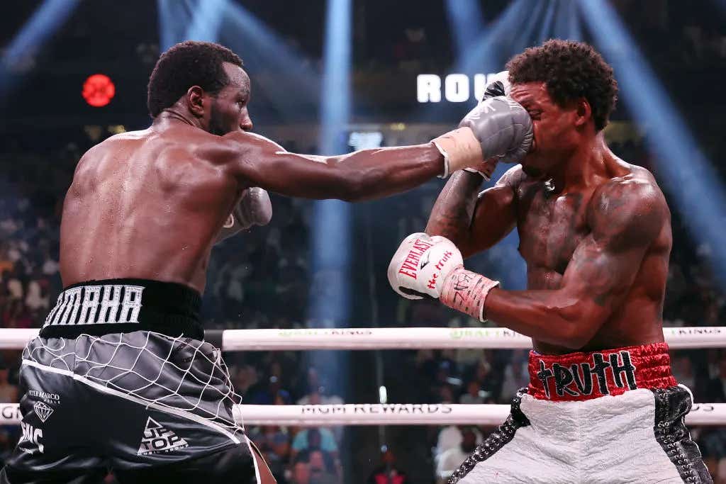 Terence Crawford punches Errol Spence Jr. during round 5 of the World Welterweight Championship bout at T-Mobile Arena. Who are the best boxers in the world right now, pound-for-pound?