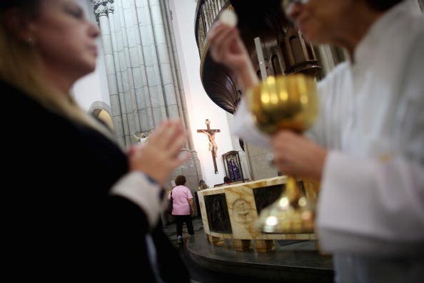 Brazil's Catholics Await Election Of Pope During The Conclave In The Vatican. A Florida priest bit a woman during Mass at a Catholic church after she tried to improperly receive Holy Communion.