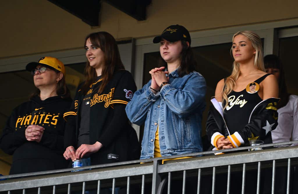 Livvy Dunne (R) watches as her boyfriend Paul Skenes #30 of the Pittsburgh Pirates (not pictured) makes his major league debut during the game against the Chicago Cubs beat PNC Park. It's worth asking if Livvy Dunne will have the Taylor Swift effect on the MLB.