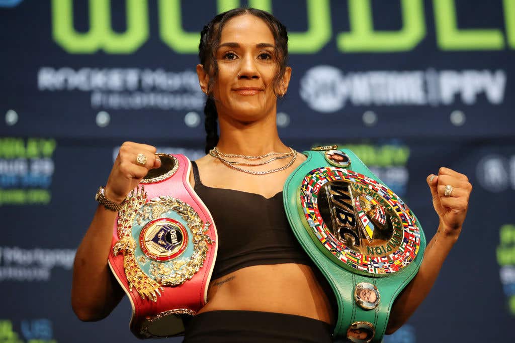 Amanda Serrano poses for media with her belts during a press conference before her fight against Yamileth Mercado at The Novo. Today, the best female boxers in the world really stand up to any of the guys. So, which female boxers are currently ruling it in the ring in 2024?