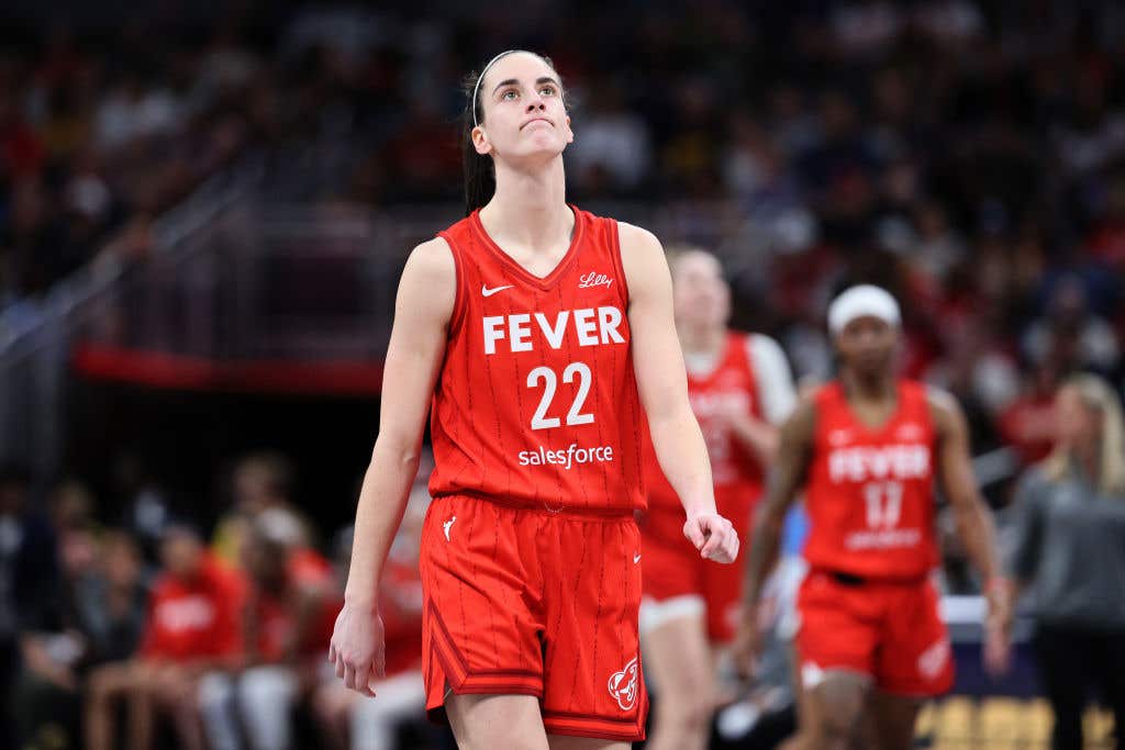 Caitlin Clark #22 of the Indiana Fever reacts against the Chicago Sky during the fourth quarter in the game at Gainbridge Fieldhouse on June 01, 2024 in Indianapolis, Indiana. Caitlin Clark teammates should have stood up for her.