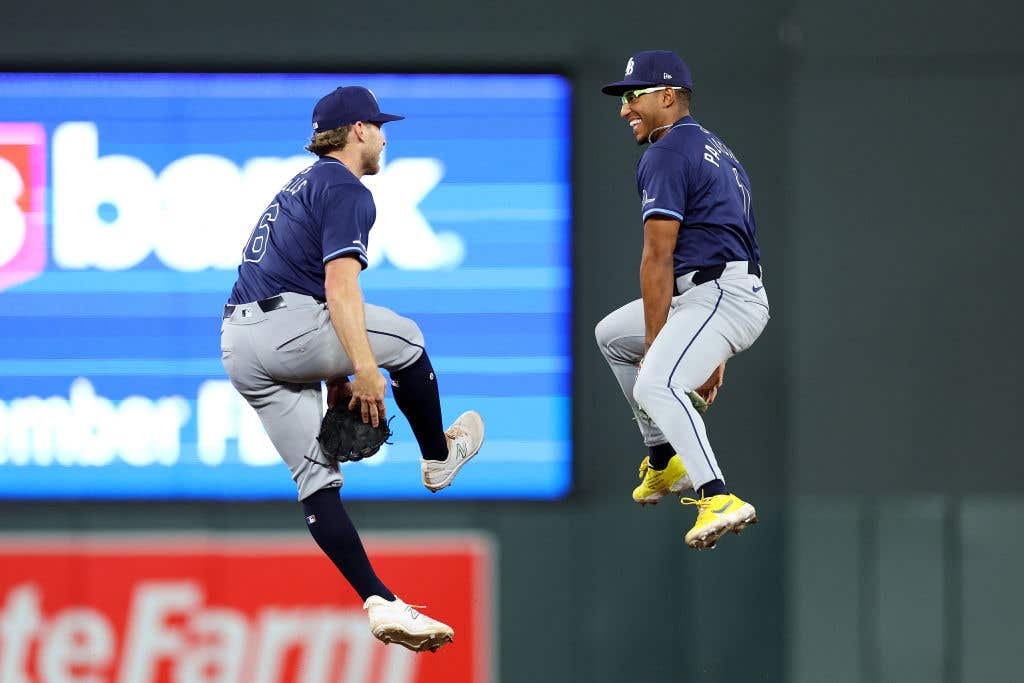 Taylor Walls #6 and Richie Palacios #1 of the Tampa Bay Rays celebrate their victory against the Minnesota Twins after the game at Target Field on June 19, 2024 in Minneapolis, Minnesota. The Rays defeated the Twins 3-2 in ten innings.