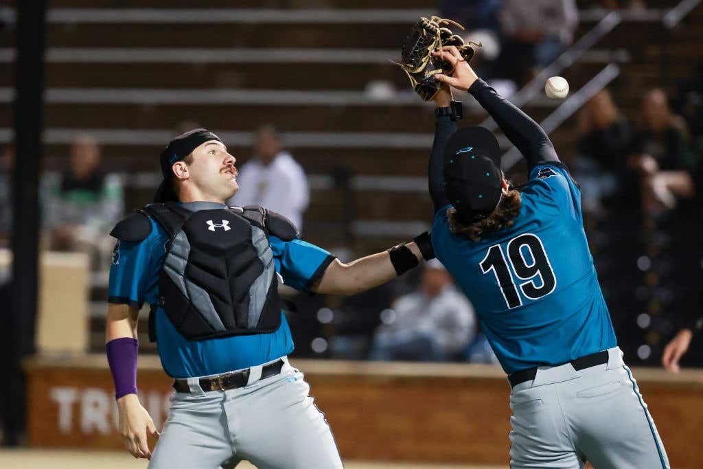 Derek Bender playing catcher for Coastal Carolina. Fort Myers Mighty Mussels Player Cut For Allegedly Helping Opponents