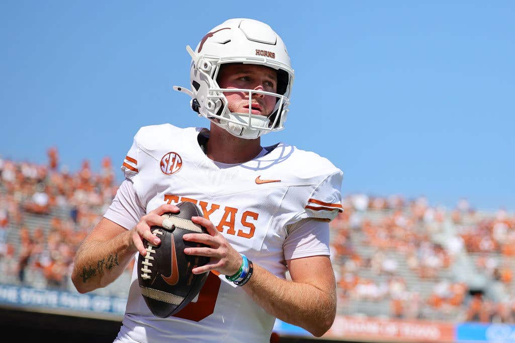 SEC Continues to Deliver. Quinn Ewers #3 of the Texas Longhorns warms up prior to a game against the Oklahoma Sooners at Cotton Bowl Stadium on October 12, 2024 in Dallas, Texas.