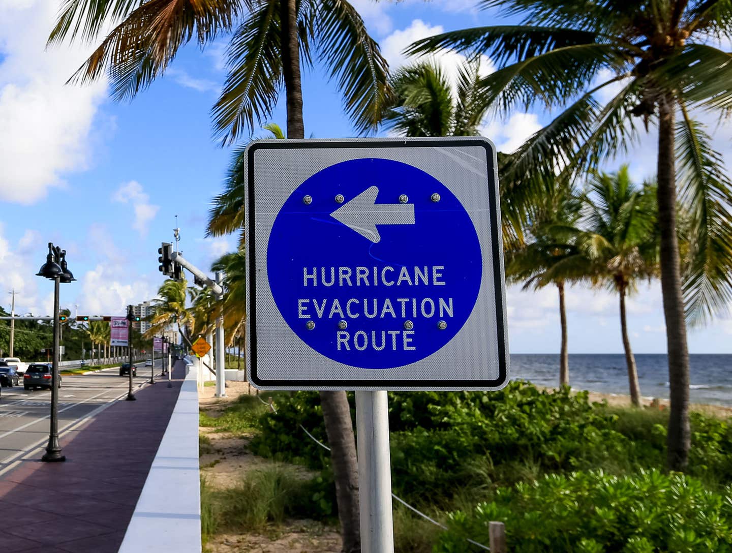 A sign points to an evacuation route in Florida.