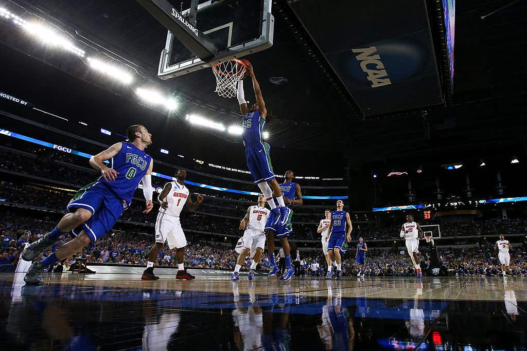 Sherwood Brown #25 of the Florida Gulf Coast Eagles goes up against the Florida Gators during the South Regional Semifinal round of the 2013 NCAA Men's Basketball Tournament