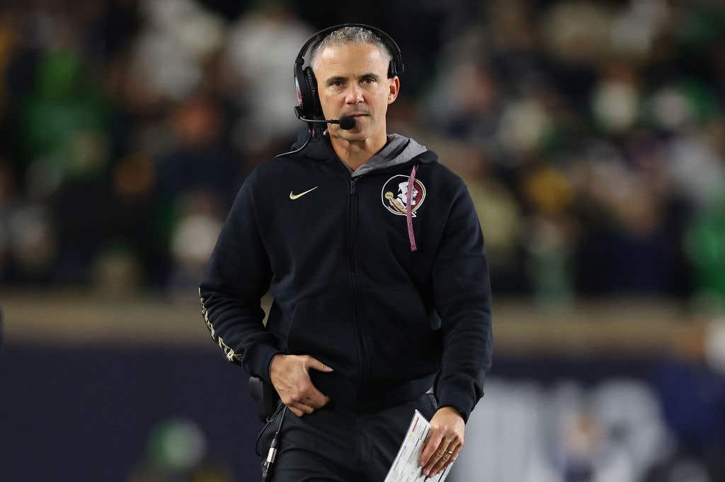 Head coach Mike Norvell of the Florida State Seminoles looks on against the Notre Dame Fighting Irish during the first half at Notre Dame Stadium