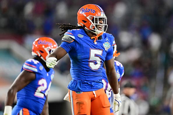 Myles Graham #5 of the Florida Gators reacts after intercepting a ball