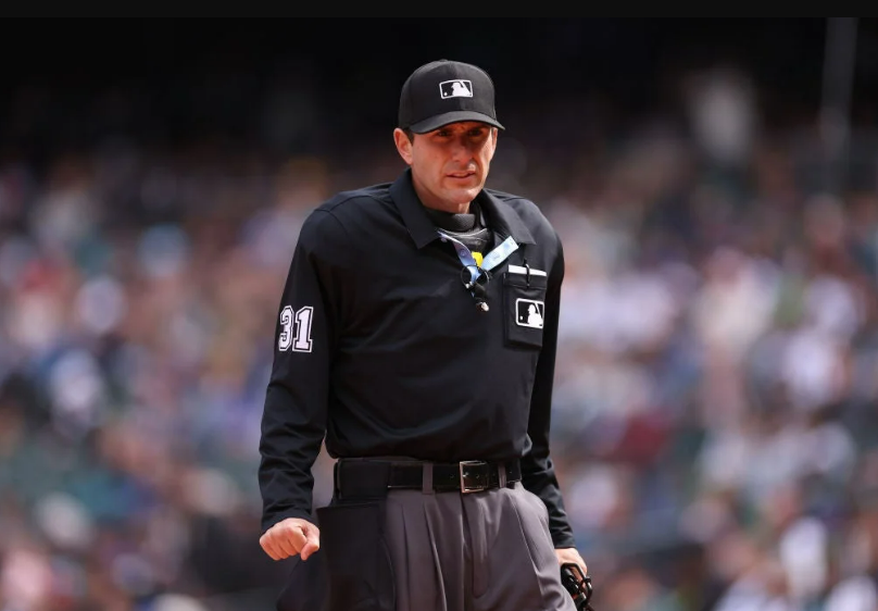 SEATTLE, WASHINGTON - APRIL 05: Umpire Pat Hoberg #31 looks on during the first inning between the Seattle Mariners and the Los Angeles Angels at T-Mobile Park on April 05, 2023 in Seattle, Washington.