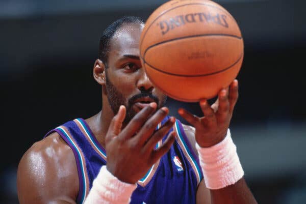 Karl Malone #32, Power Forward for the Utah Jazz looks at the basketball as he prepares to make a free throw