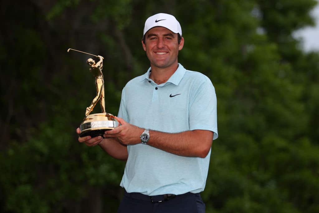 Scottie Scheffler of the United States celebrates with the trophy after winning during the final round of THE PLAYERS Championship on THE PLAYERS Stadium Course at TPC Sawgrass