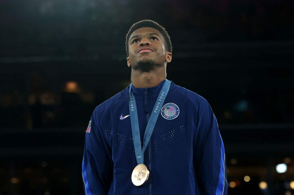 Bronze Medalist Omari Jones of Team United States poses on the podium during the Boxing Men's 71kg medal ceremony after the Boxing Men's 71kg Final match on day fourteen of the Olympic Games Paris 2024