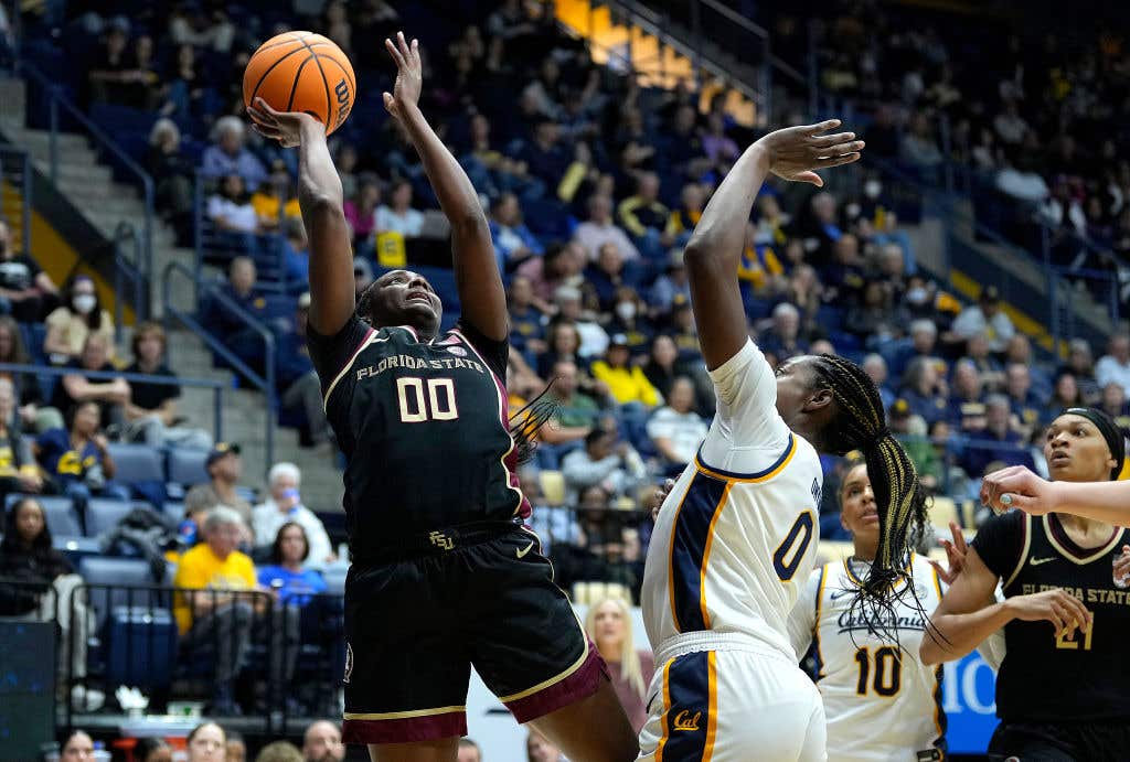 Ta'Niya Latson #00 of the Florida State Seminoles shoots over Ugonne Onyiah #0 of the California Golden Bears during the second half at Haas Pavilion on January 12, 2025 in Berkeley, California.