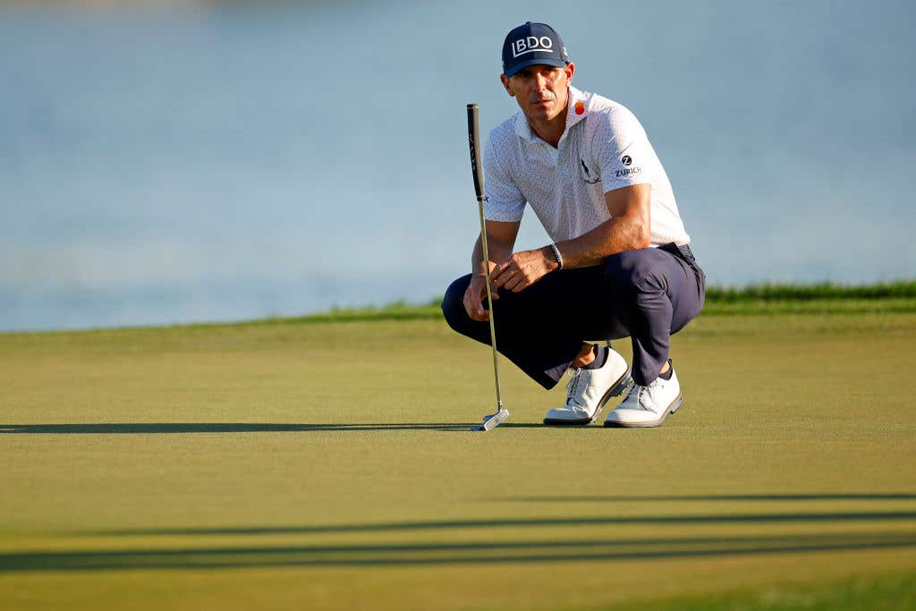 Billy Horschel of the United States lines up a putt on the 18th green during the second round of the Cognizant Classic in The Palm Beaches 2025