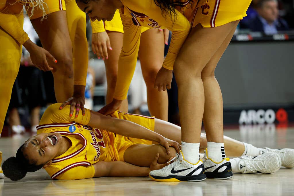 JuJu Watkins #12 of the USC Trojans after an injury against the Mississippi State Bulldogs in the first half during the second round of the NCAA Women's Basketball Tournament