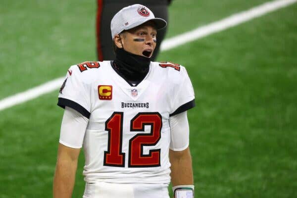 Tom Brady wearing a #12 Tampa Bay Buccaneers uniform