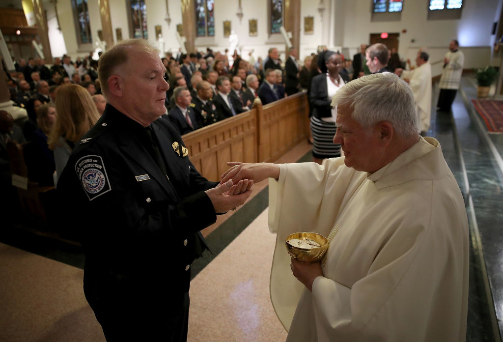 Annual Blue Mass Held At D.C.'s St. Patrick's Catholic Church For First Responders Who Died Over Last Year.

A Florida priest bit a woman during Mass at a Catholic church after she tried to improperly receive Holy Communion.